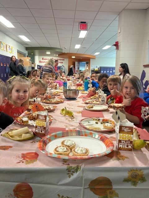 Preschool students enjoying their Friendsgiving meal.