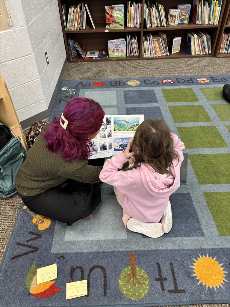 MSU students reading with 1st graders