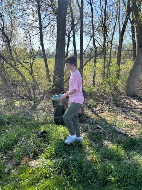 Students picking up trash at the park