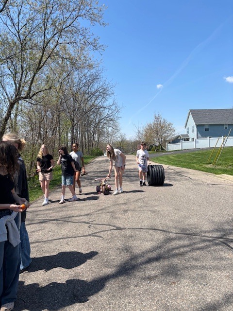 Students picking up trash at the park