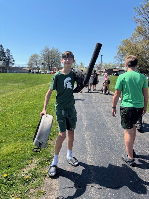 Students picking up trash at the park