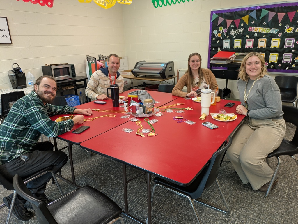 Teachers enjoying lunch in the lounge