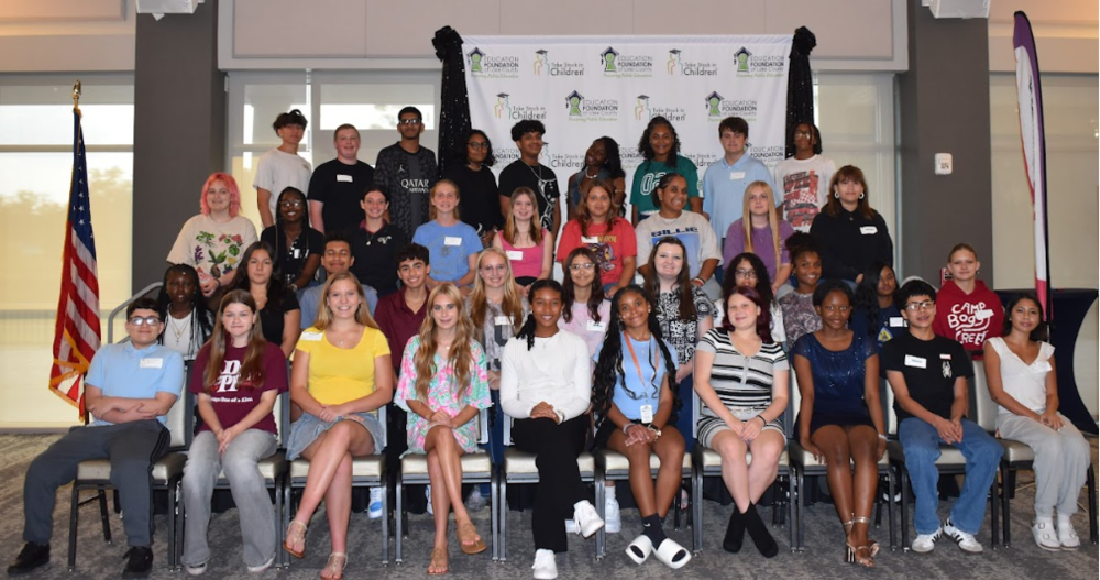 Take Stock in Children students for 2025-26 posed standing on risers