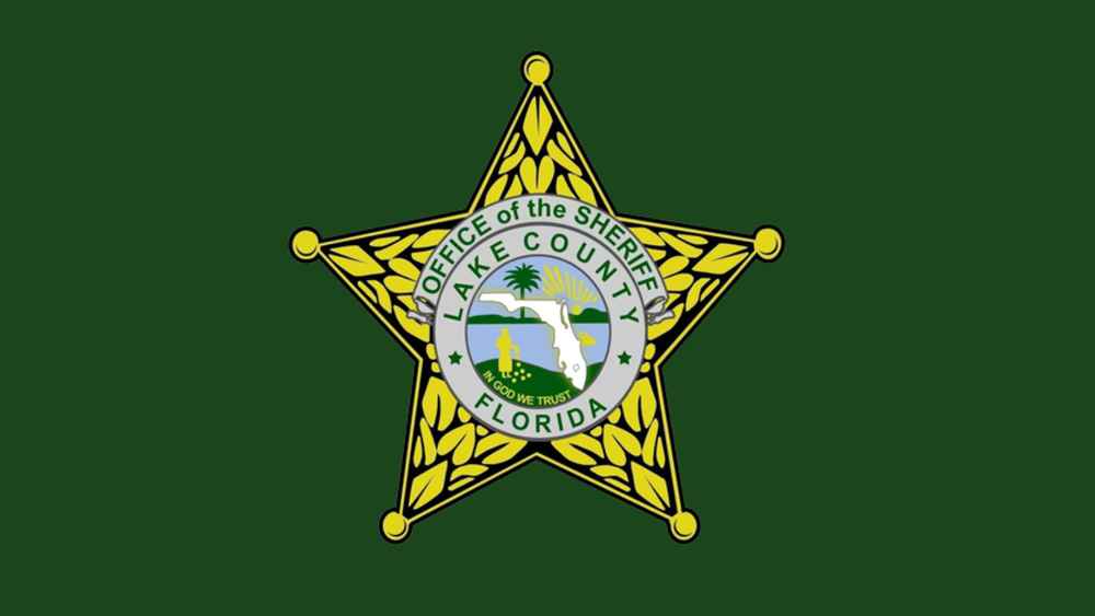 Image of Lake County Sheriff's Office gold, five-star badge against a dark green background
