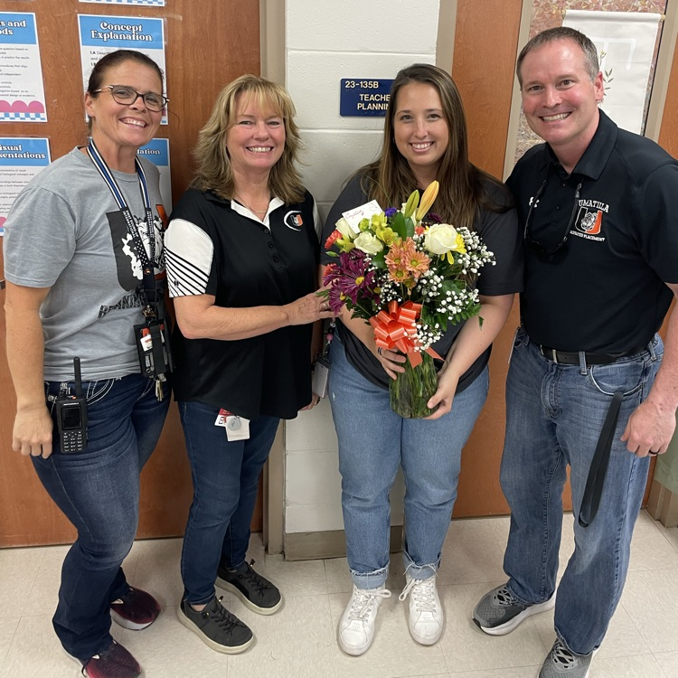 UHS Teacher of the Year, Kimberly Tyrrell with Assistant Principals Theresa Camp & Tes Rogers, and Principal Brent Frazier.