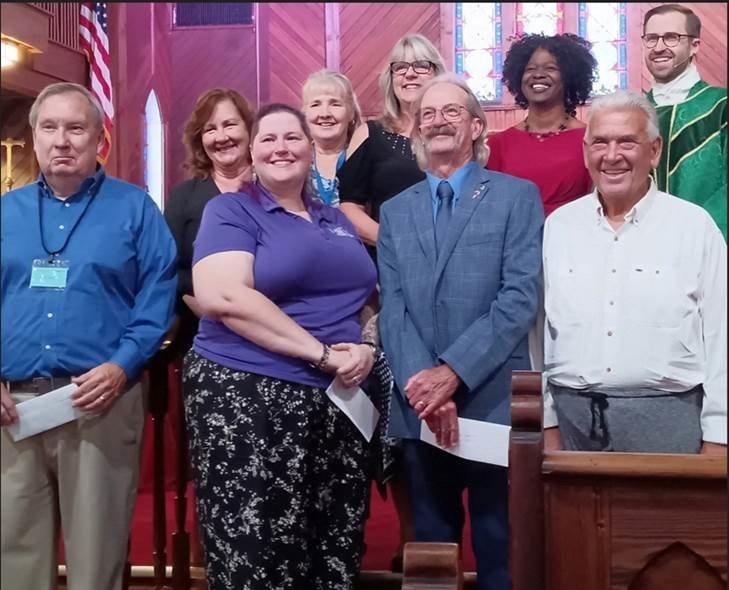 Posed picture of smiling adults