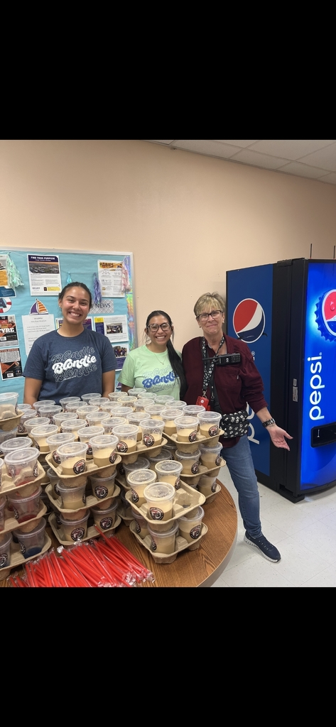 Picture of Laurie Saputo and two wonderful ladies from 7Brew Coffee with the donated coffee and energy drinks.