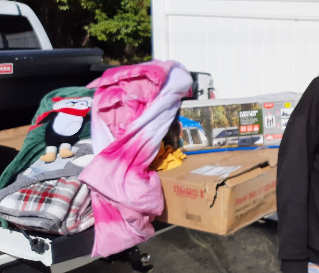 Dr. S's truck full of blankets, a tent and a new sofa in the box.