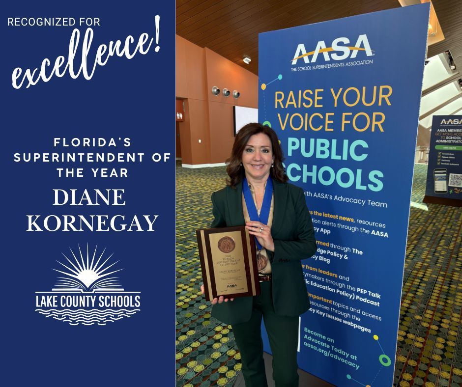 Picture of Diane Kornegay wearing a medal and holding a plaque in front of banner that says AASA Raise Your Voice for Public Schools. Wording says recognized for excellence, Florida's Superintendent of the Year, Diane Kornegay. Lake County Schools logo