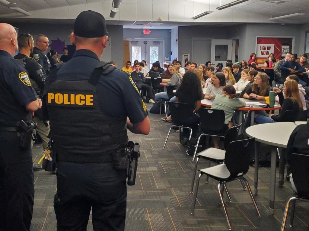 Representatives from Umatilla Police Department and Mount Dora Police Department speak at the UHS Bulldog Student Union as part of the  Career Talk series where students learn about real careers in the area.