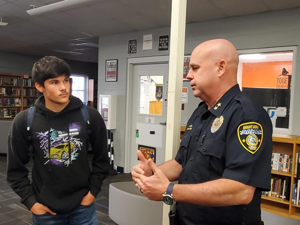 Representatives from Umatilla Police Department and Mount Dora Police Department speak at the UHS Bulldog Student Union as part of the  Career Talk series where students learn about real careers in the area.
