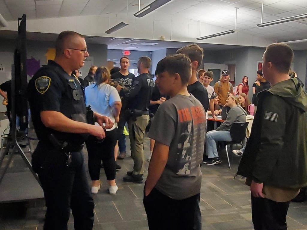 Representatives from Umatilla Police Department and Mount Dora Police Department speak at the UHS Bulldog Student Union as part of the  Career Talk series where students learn about real careers in the area.