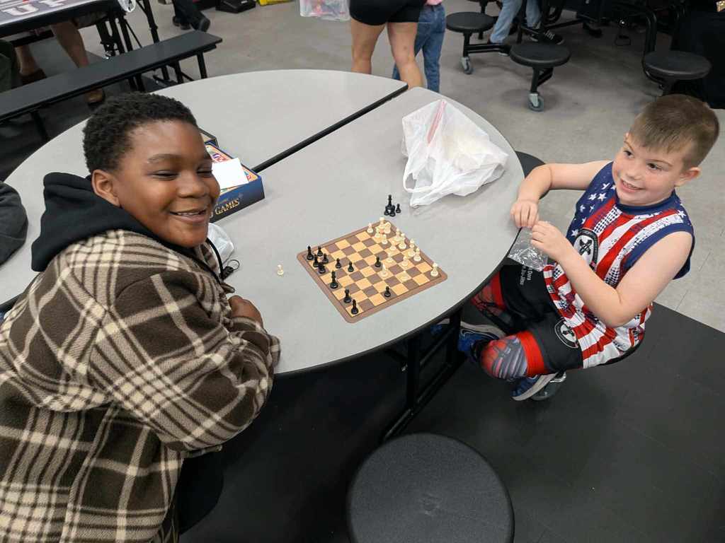 two boys playing chess