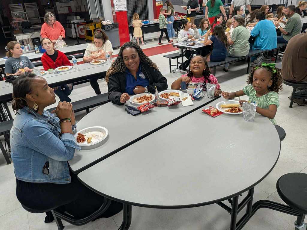 families enjoying dinner