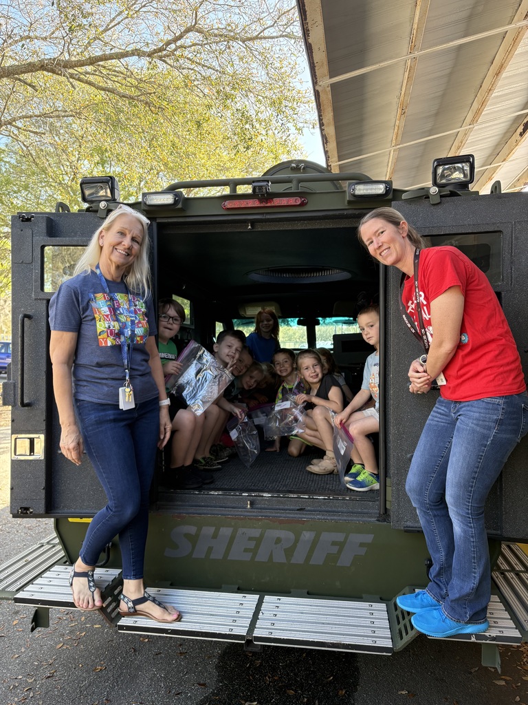 students in a SWAT truck