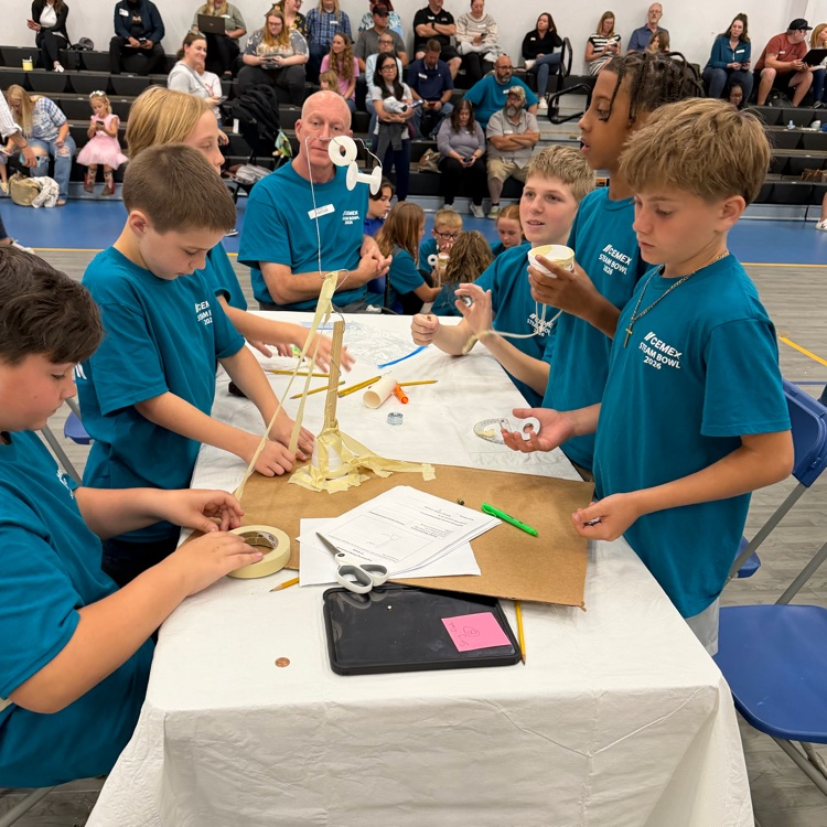 The boys team working on their engineering piece!