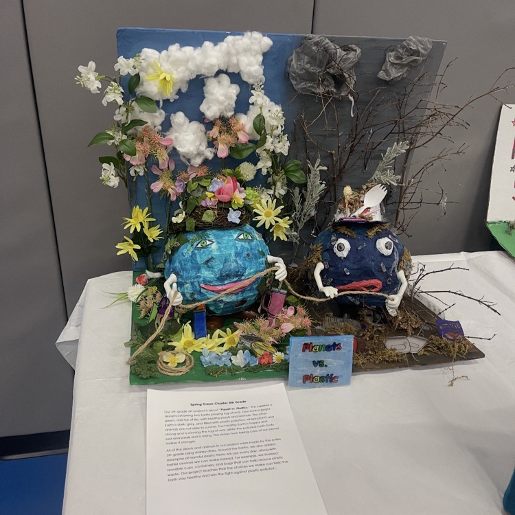 Their final art piece. Planet vs. Plastic