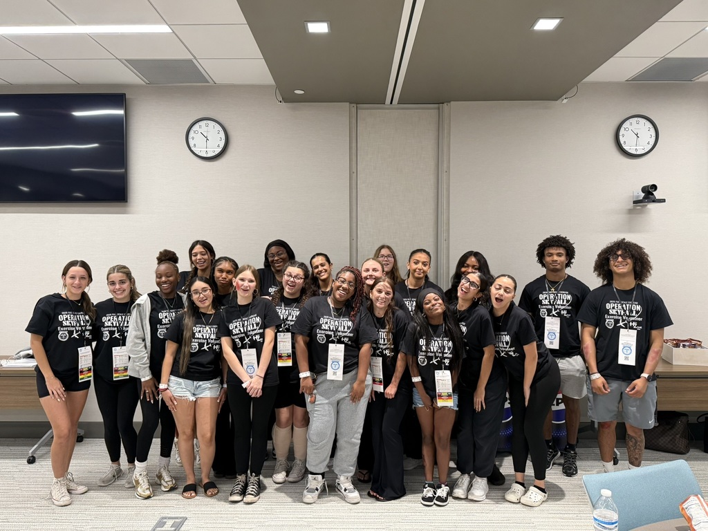 Student enactors pose as group