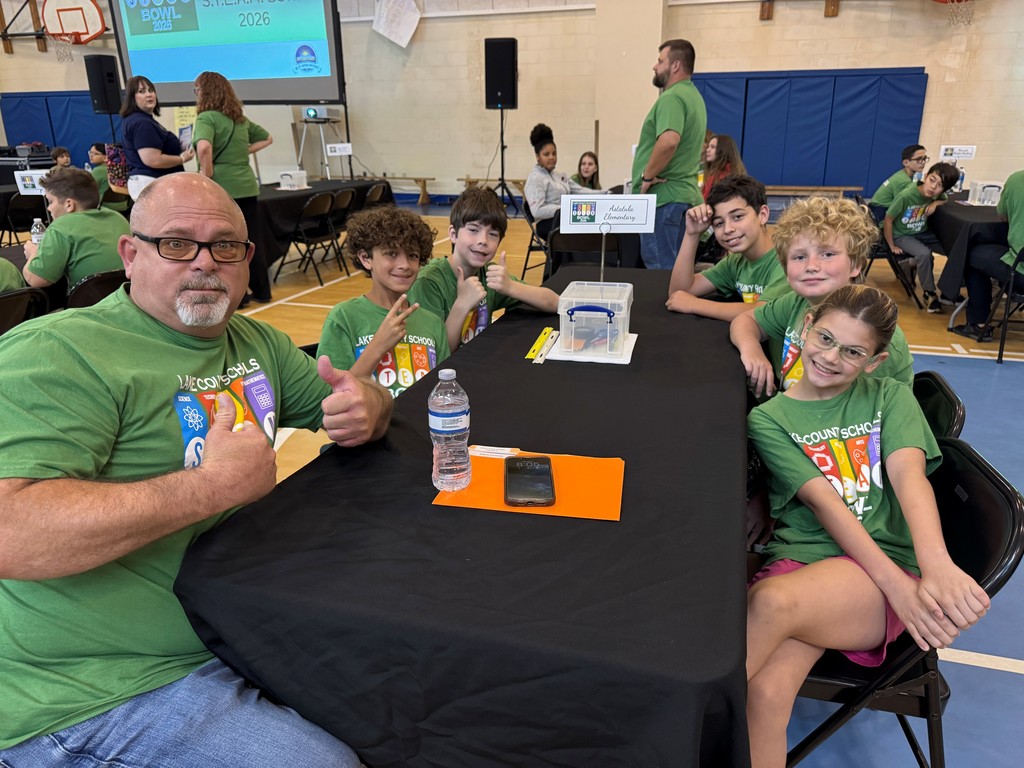 This is the Astatula Elementary STEAM team sitting at their table at the STEAM Bowl. 