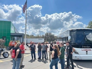 Students getting off the chartered bus at Lake Technical College