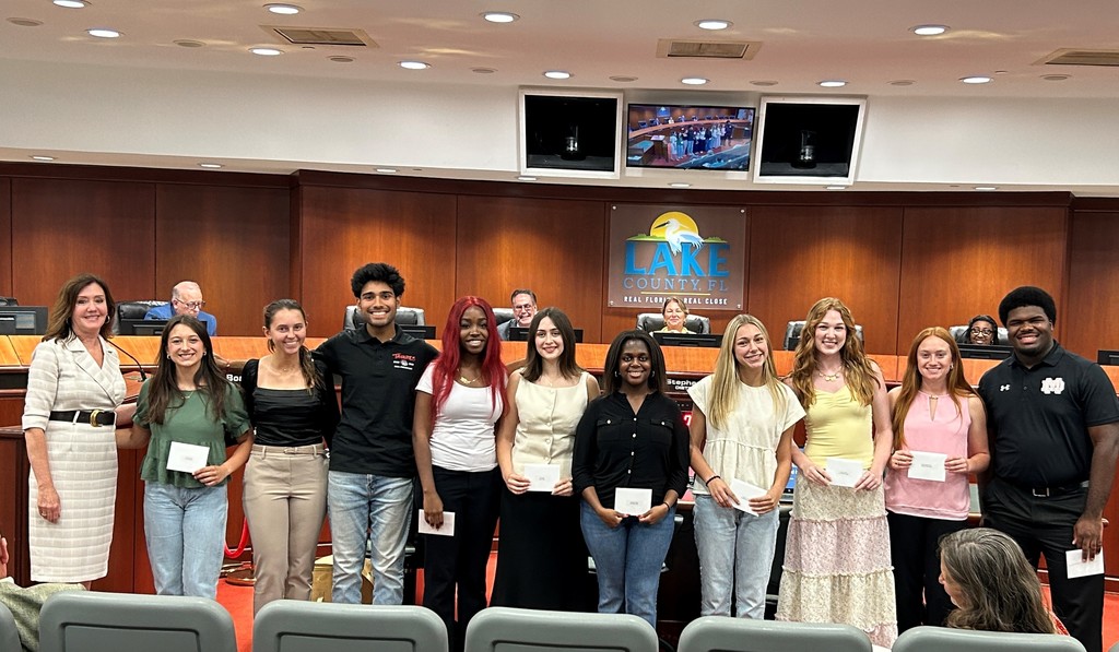 Students posed with Superintendent Kornegay in the county commissioners' board room