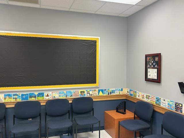 Mount Dora Lowes supports Triangle Elementary with paint, supplies, and volunteers to redo our front office