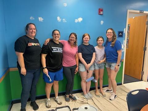 Mount Dora Lowes supports Triangle Elementary with paint, supplies, and volunteers to redo our front office