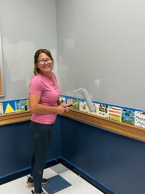 Mount Dora Lowes supports Triangle Elementary with paint, supplies, and volunteers to redo our front office