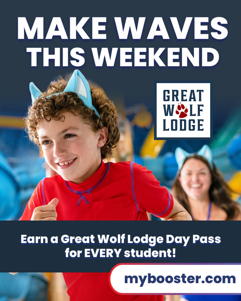 A boy wearing blue wolf ears smiles at the camera. The background shows a blurred image of a person and a blue sign. Text says "Make waves this weekend" and "Earn a Great Wolf Lodge Day Pass for Every Student!"