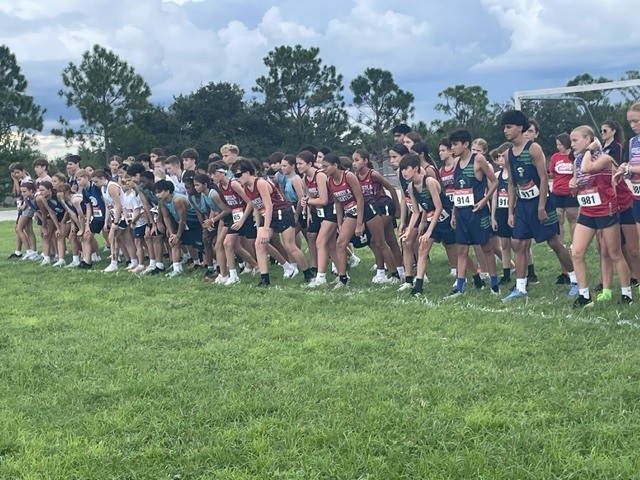 Pictures of Cross Country Meet, athletes running the course 
