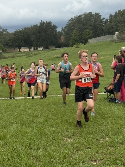 Pictures of Cross Country Meet, athletes running the course 