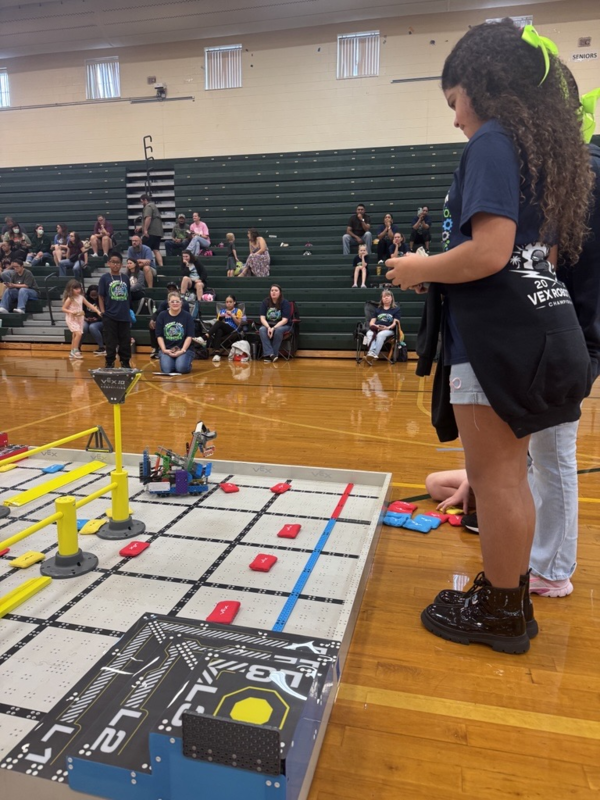 students compete with robotics