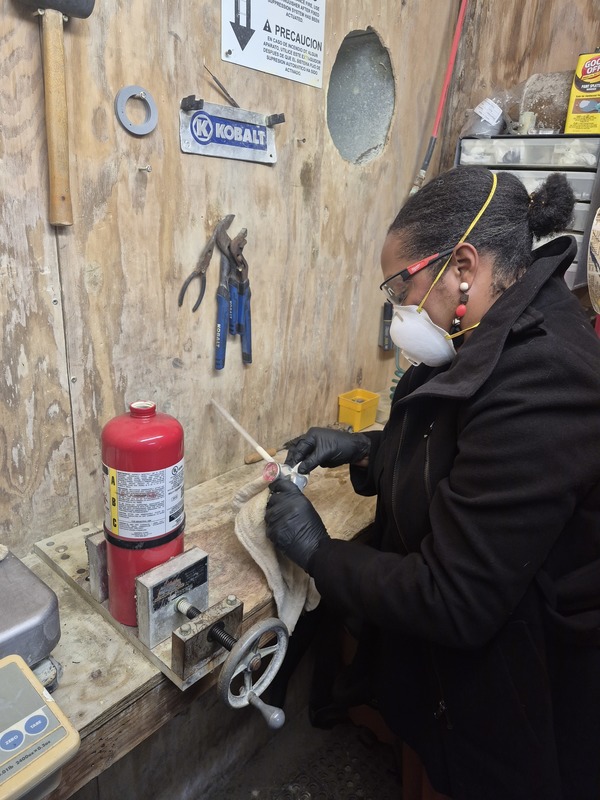 Teacher working with wood