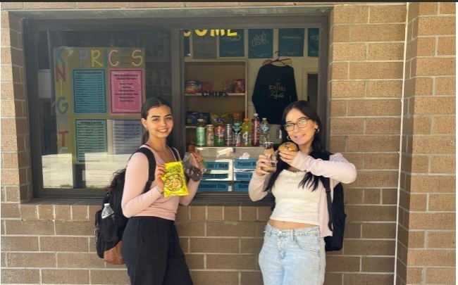 Customers buying snacks from the ERHS Knights Market