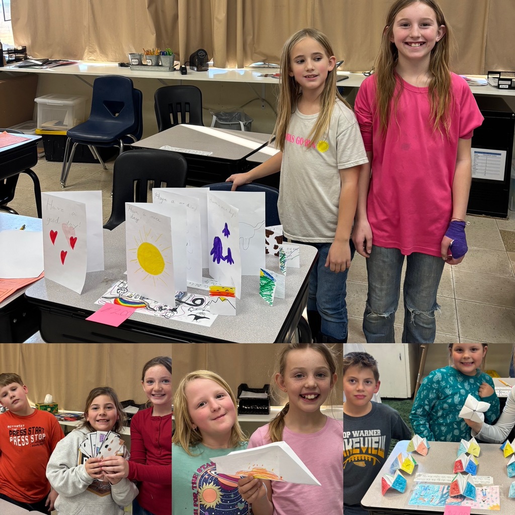 students posing with their products