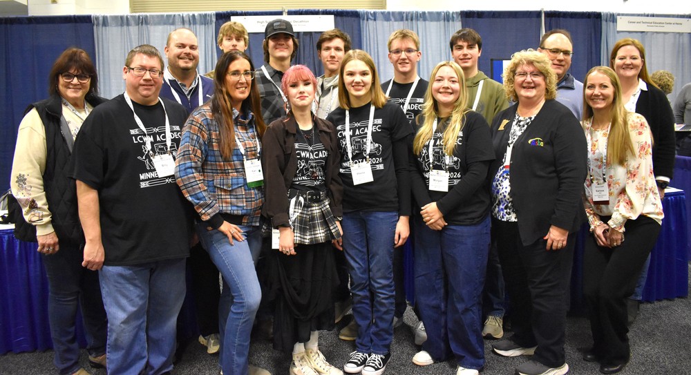 School Board and AcaDec members posing together