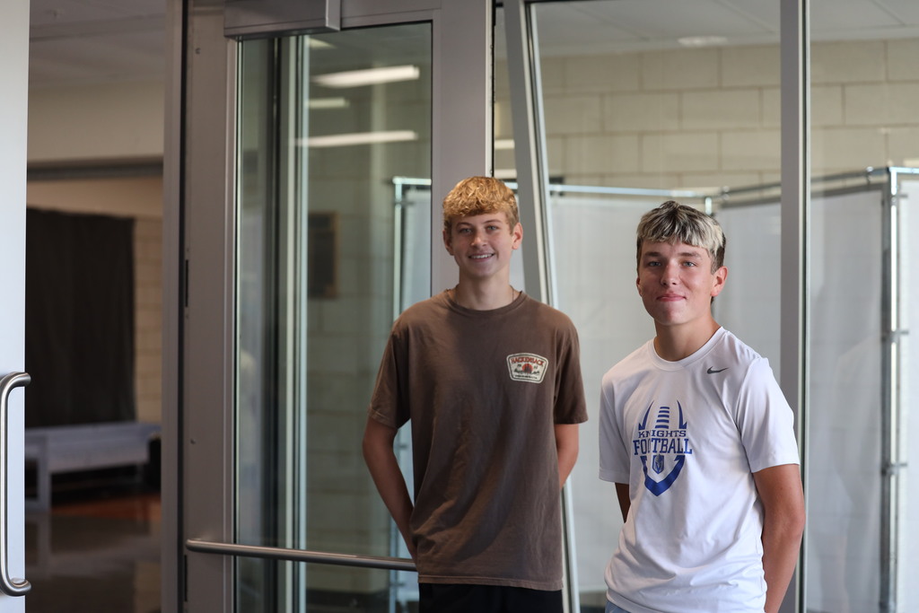Student council members greeting students