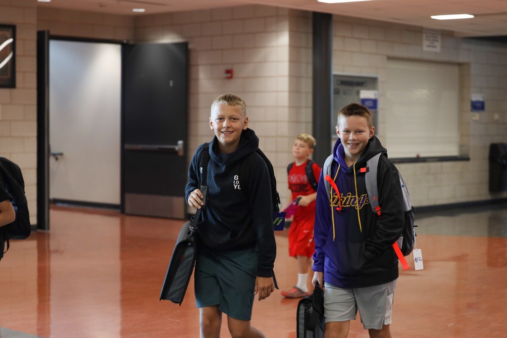 Students walking in hall way