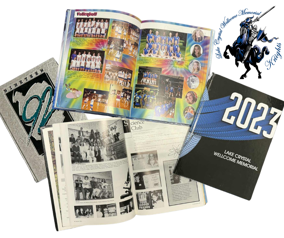 Photo of old yearbooks laying open and closed 
