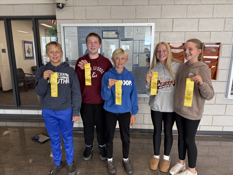 fourth place knowledge bowl team holding their ribbons 