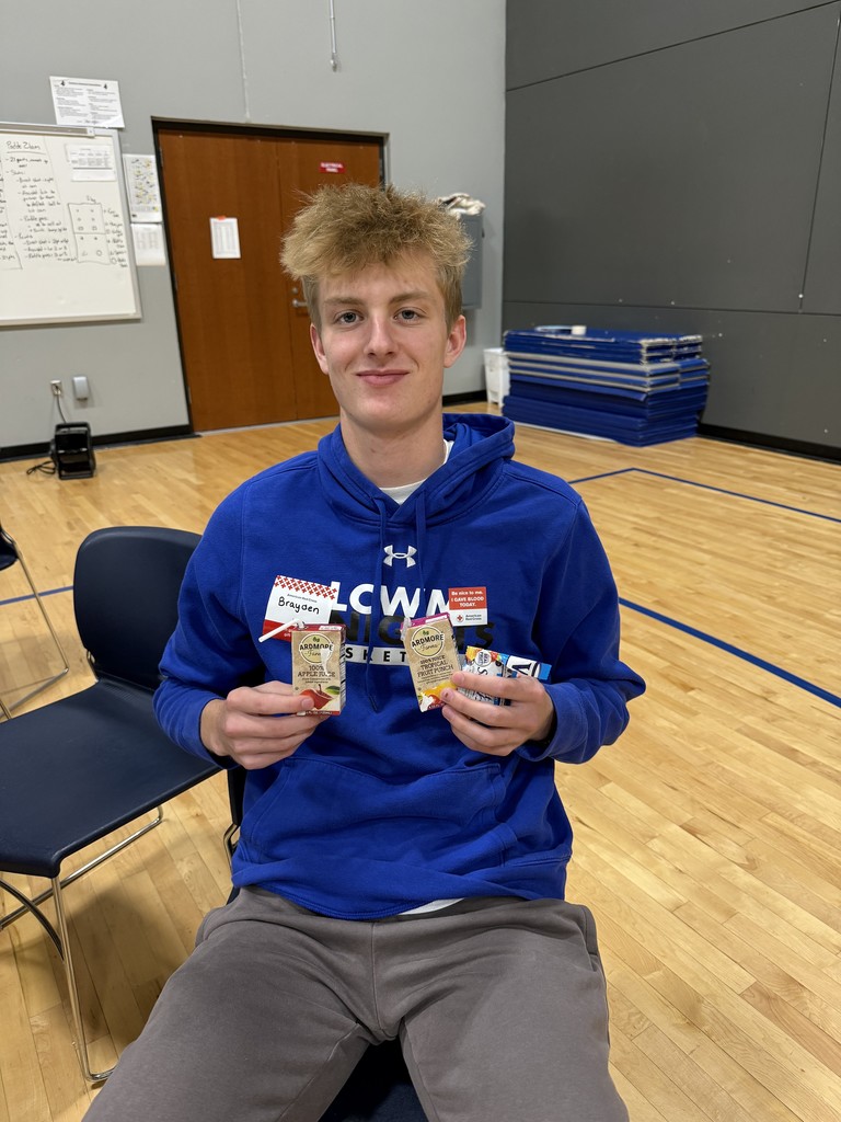 student eating a snack after donating blood.
