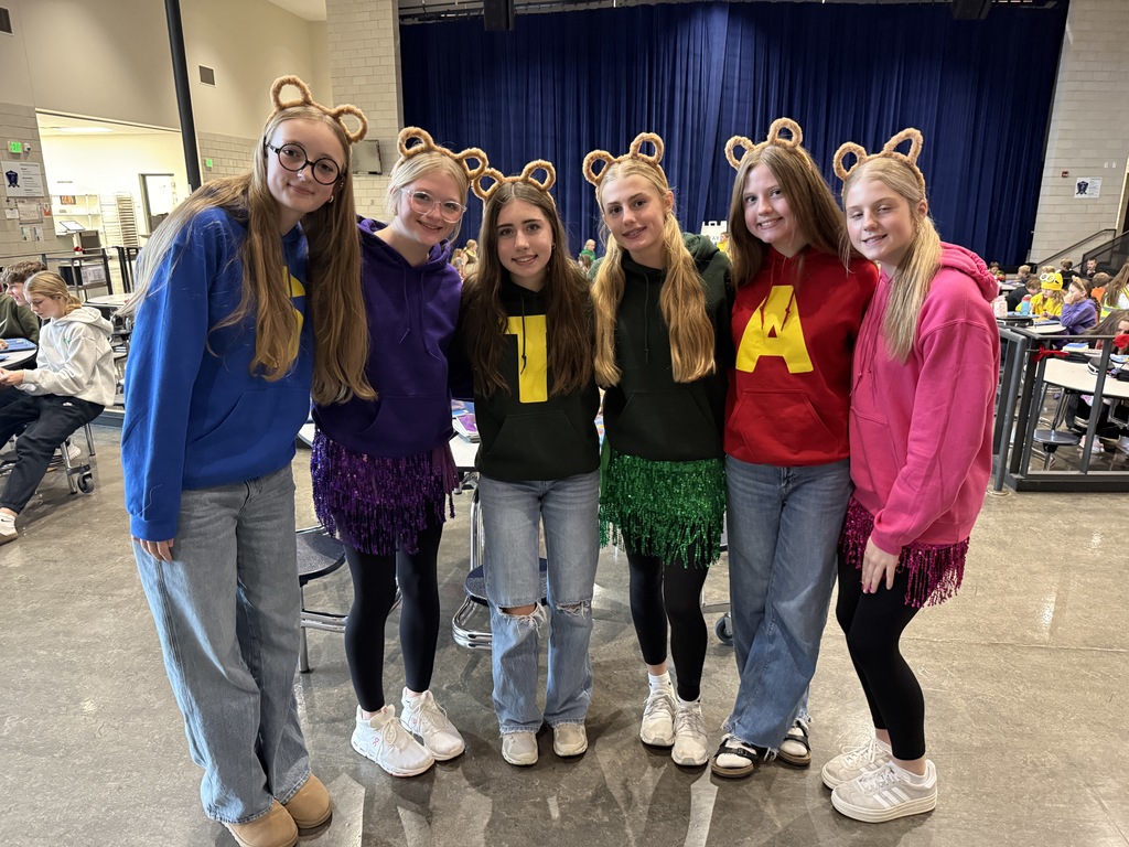 Students dressed up as Alvin and Chipmunks and the Chipets.