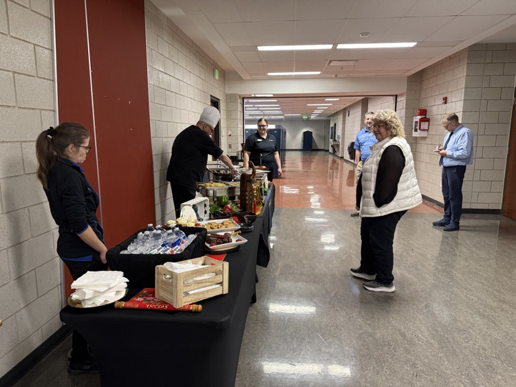 Chef Tony, Amber and Sharona serving the board a Mongolian grill meal.