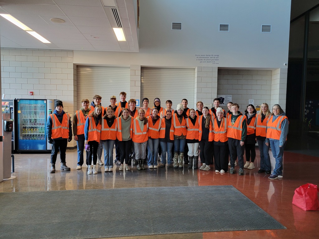 Group photo of the NHS going to clean ditches