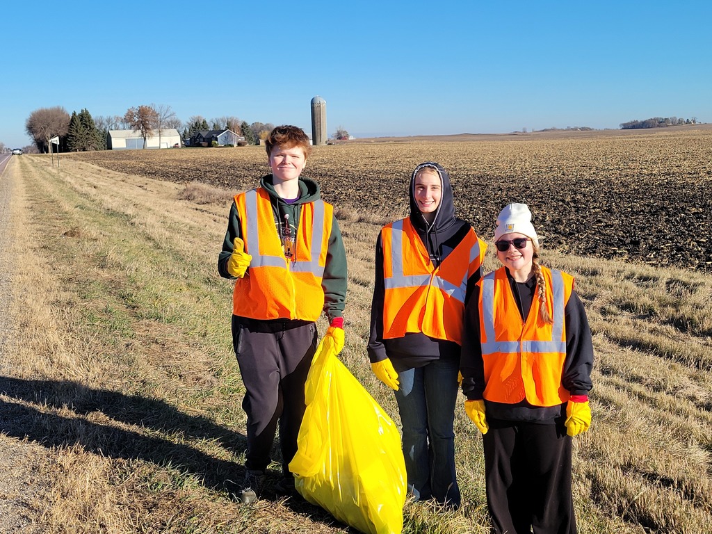 Students cleaning up ditches.