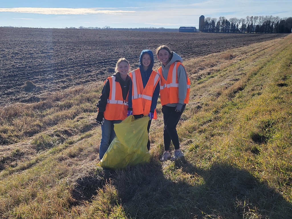 Students cleaning up ditches.
