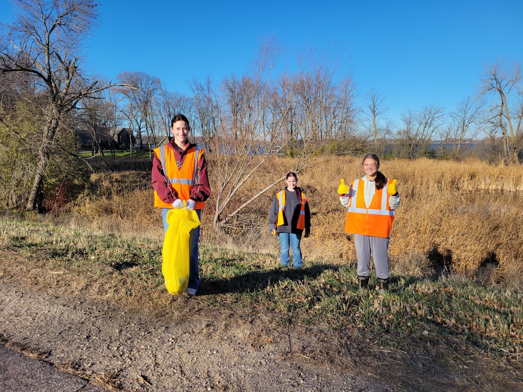 Students cleaning up ditches.