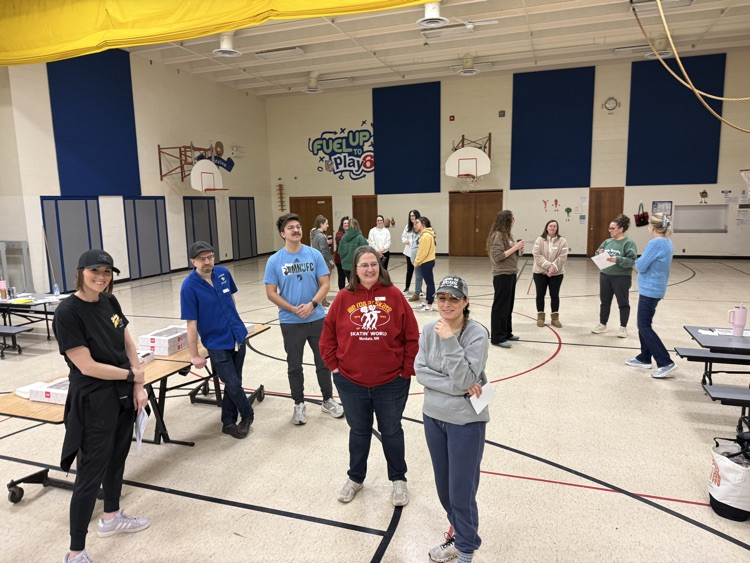 staff members standing in a group during the training