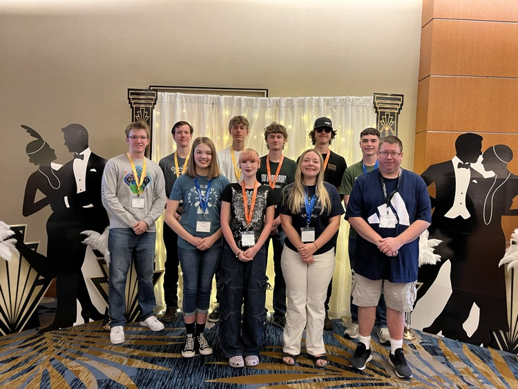 students lined up smiling at camera 
