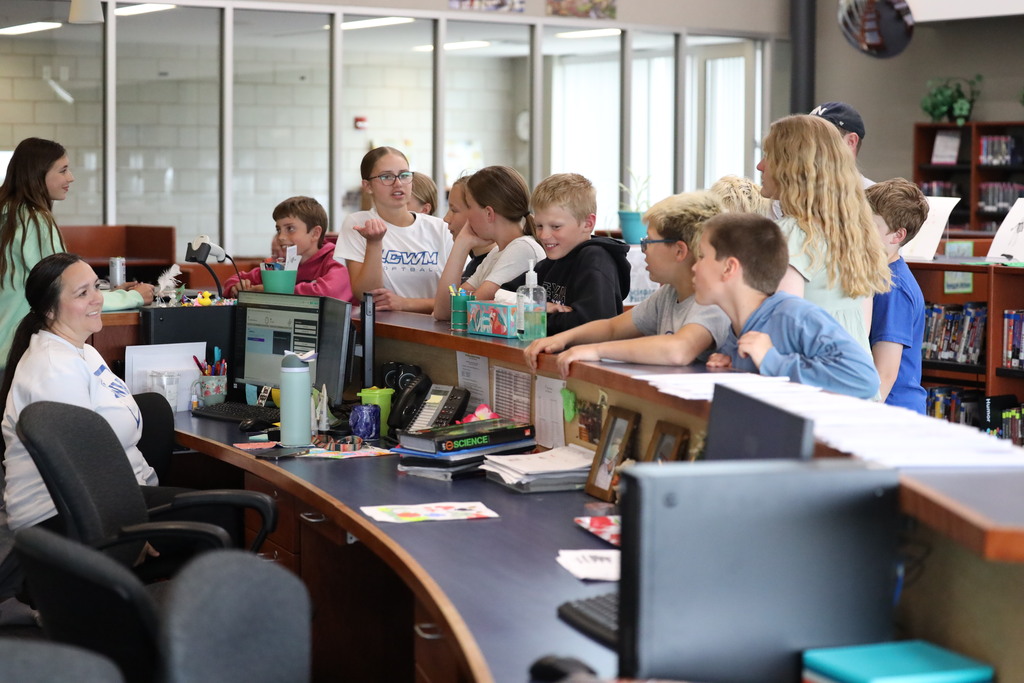 students in library.